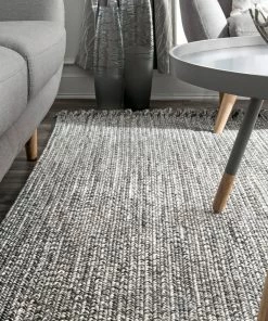 NLD BRAIDED COURT TASSEL PEPPER RUG