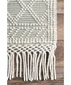 NLD HAND WOVEN TABAT TASSEL MID CENTURY