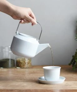 KN BLACK CERAMIC TEA CUP & SAUCER